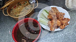 Indonesian breakfast Nasi rawon , rempeyek undang, and jangan lodeh is very nice