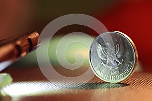 Indonesian coin with logo of Java Eagle