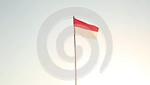 indonesian flag celebrating independence day blue sky sunrise