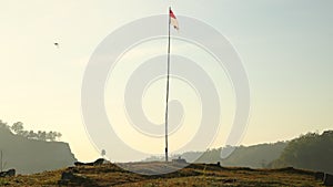 indonesian flag celebrating independence day blue sky sunrise