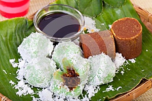 Indonesian Food Klepon with coconut on banana leaf