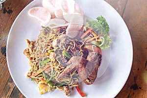 Indonesian food, mie goreng ayam, fried noodles with chicken. Bali, Indonesia.