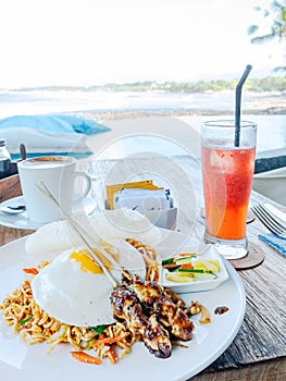 Indonesian food, mie goreng and chicken satay