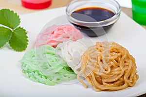 Indonesian Food Putu Mayang with red sugar