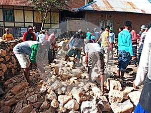 Indonesian local people working together building neighbor's house, Asian male construction workers and labor day