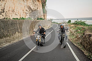 indonesian men riders on motorcycle adventure