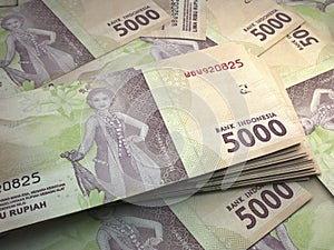 Indonesian money. Indonesian rupiah banknotes. 5000 IDR rupiahs bills