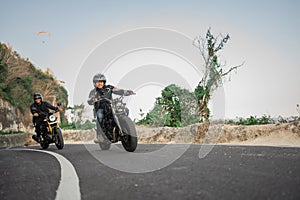 indonesian motorcyclist traveling on the road