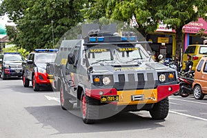 Indonesian police combat car at street in pre-election rally the Indonesian Democratic Party of Struggle in Bali, Indonesia