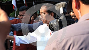 Indonesian President Joko Widodo ora Jokowi when visiting a traditional market
