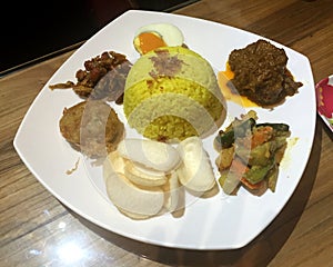 Indonesian Rice Dish Nasi Lemak Nasi Kuning Malaysian Food Fragrant Rice Dish Coconut Milk Pandan Leaf Shrimp Cracker Beef Rendang