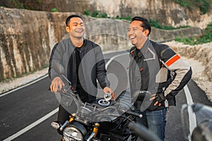 indonesian riders doing fuel tank inspection