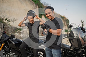 indonesian riders prepare riding motorbike together