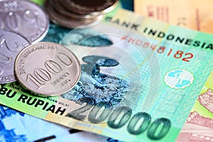 Indonesian rupiah coins and bills close up