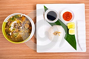 Indonesian sop saudara with rice