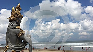 Indonesian statue in Seminyak beach Bali Indonesia