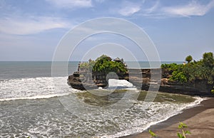 Indonesian temple on sea coast. Tanah lot complex.