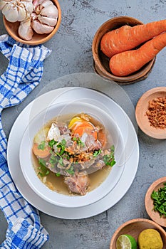 Indonesian traditional culinary, called sop buntut or oxtail soup photo