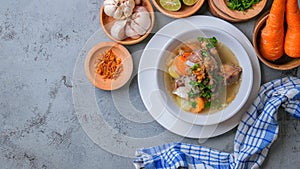 Indonesian traditional culinary, called sop buntut or oxtail soup photo