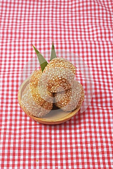 Indonesian traditional food called onde onde is a sesame coated sticky rice ball photo