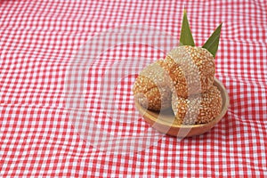 Indonesian traditional food called onde onde is a sesame coated sticky rice ball photo