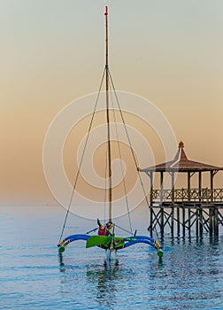 Indonesian traditional ship in Pasir Putih beach (sunrise)