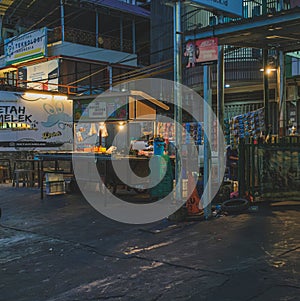 Indonesian Traditional Street Food Stall at Night