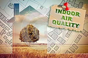 Indoor Air Quality - Healthy lifestyle with a small house against a countryside with a lone tree and city map on background