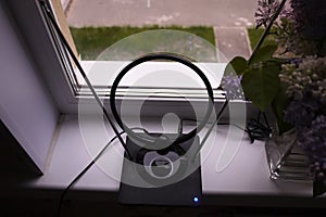 Indoor antenna for receiving TV signal. Set near the window and catches the TV. Details and close-up.