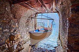 The indoor boat garage in medieval lakeside building, Gandria, Switzerland