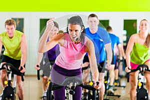 Indoor bycicle cycling in gym