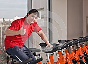 Indoor bycicle cycling in gym