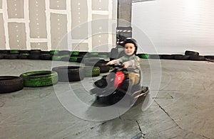 Indoor carting boy motion blur