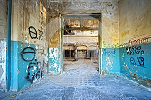 Indoor of a deserted cluttered industrial building