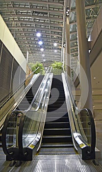 Indoor escalator with view looking up