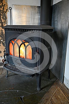 Indoor fire in a cast iron stove