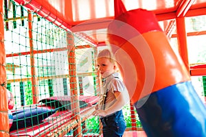 Indoor playground with colorful plastic balls for children.