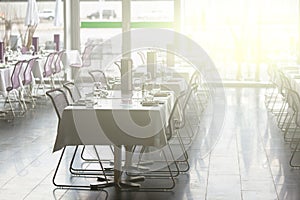 Indoor restaurant tables ready for service