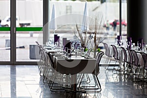 Indoor restaurant tables ready for service