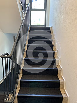 Indoor staircase of a modern apartment building