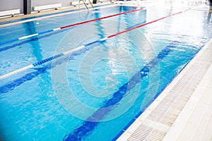 Indoor swimming pool, healthy concept.swiming pool for competition.pool with swim lanes. sport and enjoyment. Relaxation