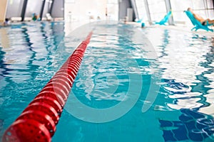 Indoor swimming pool, healthy concept.swiming pool for competition.pool with swim lanes. sport and enjoyment. Relaxation