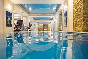 Indoor swimming pool in hotel spa center