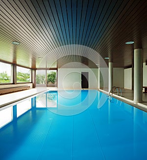 Indoor swimming pool with ladder