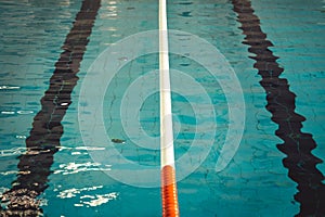 Indoor swimming pool with swim lanes.