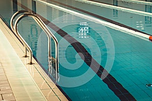 Indoor swimming pool with swim lanes.