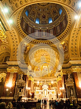 Indoor view of colorful picturesque dome ceiling in Saint Stephen`s Basilica, Budapest, Hungary