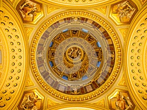 Indoor view of colorful picturesque dome ceiling in Saint Stephen`s Basilica, Budapest, Hungary