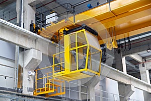 Indoors overhead crane with a cabin