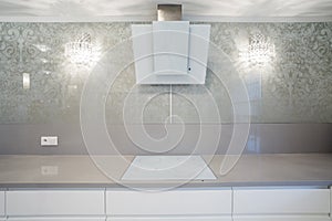 Induction hob in designer kitchen